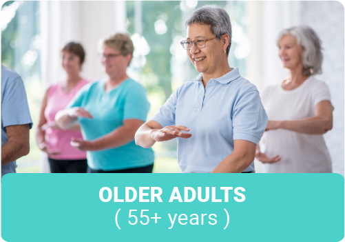 Group of older adult 55+ women doing tai chi in a group exercise class