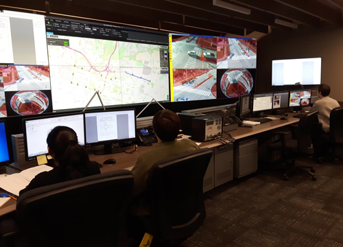 The City's Traffic Control Management Centre with multiple screens.