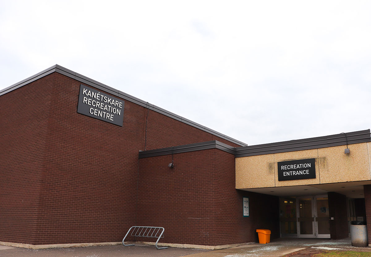 Outside of Kanetskare Recreation Centre building, showing the name sign on the wall